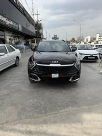 بيع مستعجل كيا سبورتج هايبرد موديل 25 برستيج داخل احمر فول موصفات واحد...
