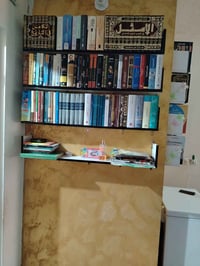 ٤ رفوف كتب • ١١٠×١٥ • الشعب