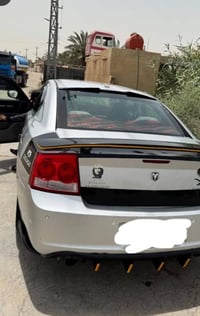 جارجر 2010 للبيع سياره حلوه خير من الله حداده تايرات مكينه بس لكير ترب...