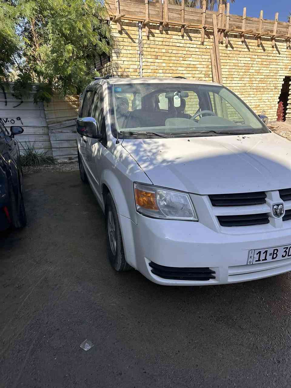 دوج كرفان 2009 رقم بغداد بسمي سونر بيه السعر 115 ***********
