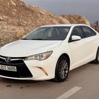 كامري ٢٠١٥ • ابيض ثلجي • ١٣٨ ألف مايل