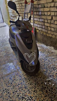 دراجة بريز مكينة ما مفتوحة بيها نواقص بسيطات العنوان بغداد الامين الثا...