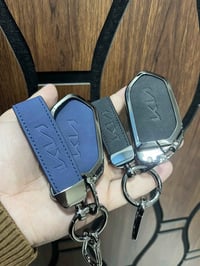 غلاف بصمة كيا تيلورايد  لونين شاموه وجلد مع شعار كيا حفر  لونين اسود ن...