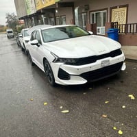 للبيع K5 LXS 2023 صور الحادث مرفقة بالصور. (بدون رقم)  السعر163 وبيه م...