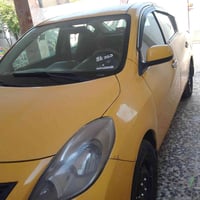 سيارة نيسان فيرسا موديل 13 أمريكي مكينة مكفوله كير بيه مشكله رقم بغداد...