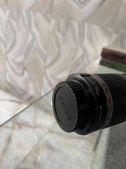 زوم كانون 55-250 نظيف جدا السعر فقط 90الف التواصل واتساب***********يوجد توصيل
