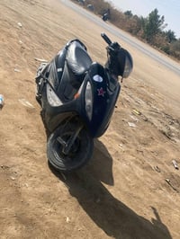 سكوتر • أسود • نجف