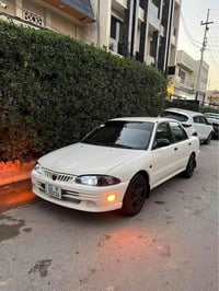 بروتون 2004 ويرا رقم بغداد بااسمي كير اوتو بدون حادث مصبوغه جماليه  عل...