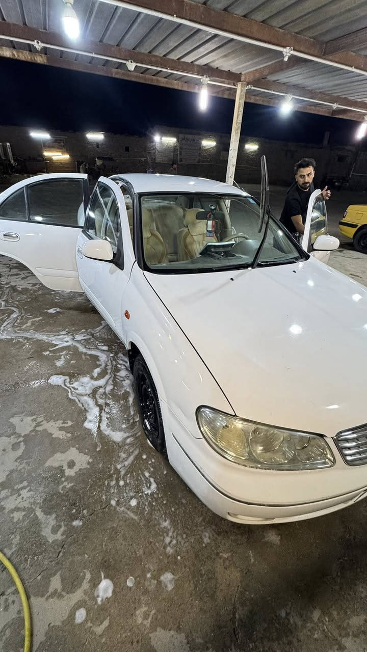 نيسان سني ٢٠٠٩
كير أوتوماتيك
الجام كهرباء 
تبريد شغال وجاهز 
السيارة مبدل بيها بنيد 
وبارد بسيط في هلال الجاملغ الايسر 
وبارد في حوض الصندوق 
غيرها ماكو شي 
رقم بغداد الماني 
السعر ٩٥ ورقة 
مكان السيارة العمارة 
*********** 
السيارة نظيفة وجاهزة
