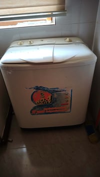 سليمانية • غسالة ملابس