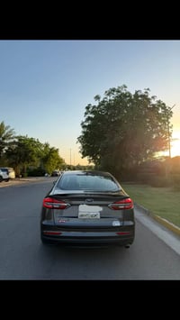 حبايب فورد فيوجن  1.5 تيربو موديل 2019 بانزين  ماشيه 74,000 كيل السيار...