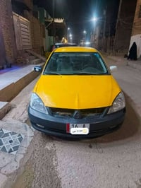 لانسر ٢٠١٠ • رقم قادسيه • مكينة وكير جديده