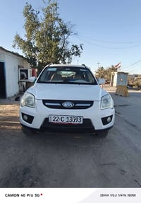 كيا سبورتج • ٢٠٠٩ • تبديل رقم