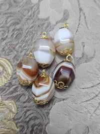 مدالية • جزع • قطعة