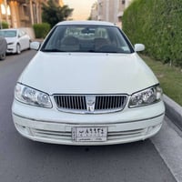 ٠٧٧١٤٧٧٦٥١٨  جديده جدا نيسان سني ياباني 2009 محرك 1600 سيارة نظيفة وجا...
