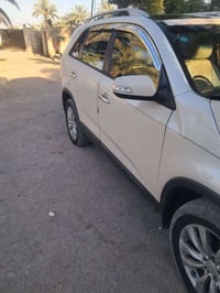 سورنتو مديل 2011امريكي فول مواصفات  تواصل على رقم 07812191050
