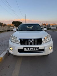 تويوتا برادو 2012 TXL   ماشية 200 الف رقم اربيل  4 سلندر السيارة كفالة...