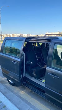 دودج كارفان 2015 وارد امريكي لون رمادي غامق عداد المسافة 138000 ميل  م...