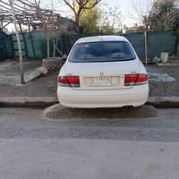 مازدا ٣٢٣ • ١٩٩٢ • رقم بابل