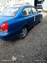 سياره النترا موديل 2005 خليجي مراوس بسيارة توسان أو سبورتج 2008/2009 و...