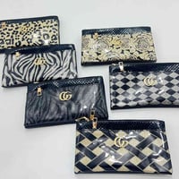 جزدان نسائي • كلتش هاتف • نقشات فهد وزيبرا