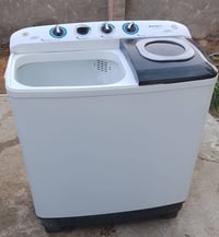 غساله ١٣ كيلو • شغاله بالكامل • ورديه خارج