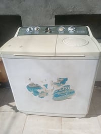 غساله تايلندي 18كيلو تغسل بطانيه ممصلحه نضيفه جدا سعرها 75وبيها مجال م...