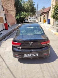 كيا ريو موديل 20 وارد امريكي بيها باب السايق مبدل فقط ولخلفي معمر نفسه...