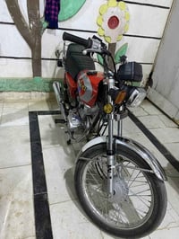 دراجة نارية • سكوتر