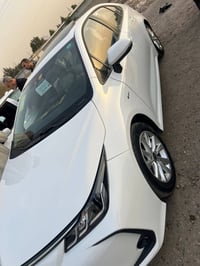 كورلا 2025  شكل الخليجي محرك 1800 هايبرد HEV  داخل جلد اسود رقم بغداد ...