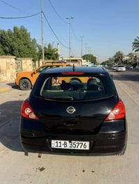 نيسان فيرسا 2007 رقم  بغداد باسمي رقم الجديد ماشيه ١٣٨  تبريد شغال  كي...