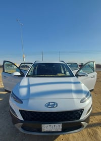 للبيع هونداي كونا لون ابيض موديل 2023  وارد امريكي بصمة / رقم بغداد   ...