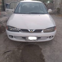 بروتون ويرا 2004 للبيع  الكير والمحرك مال مكفولات باتري جديد بلكات مشط...