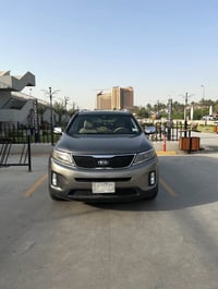 كيا سورنتو 2014 وارد امريكي رقم بغداد بأسمي  المواصفات  شاشة لمس صغيرة...
