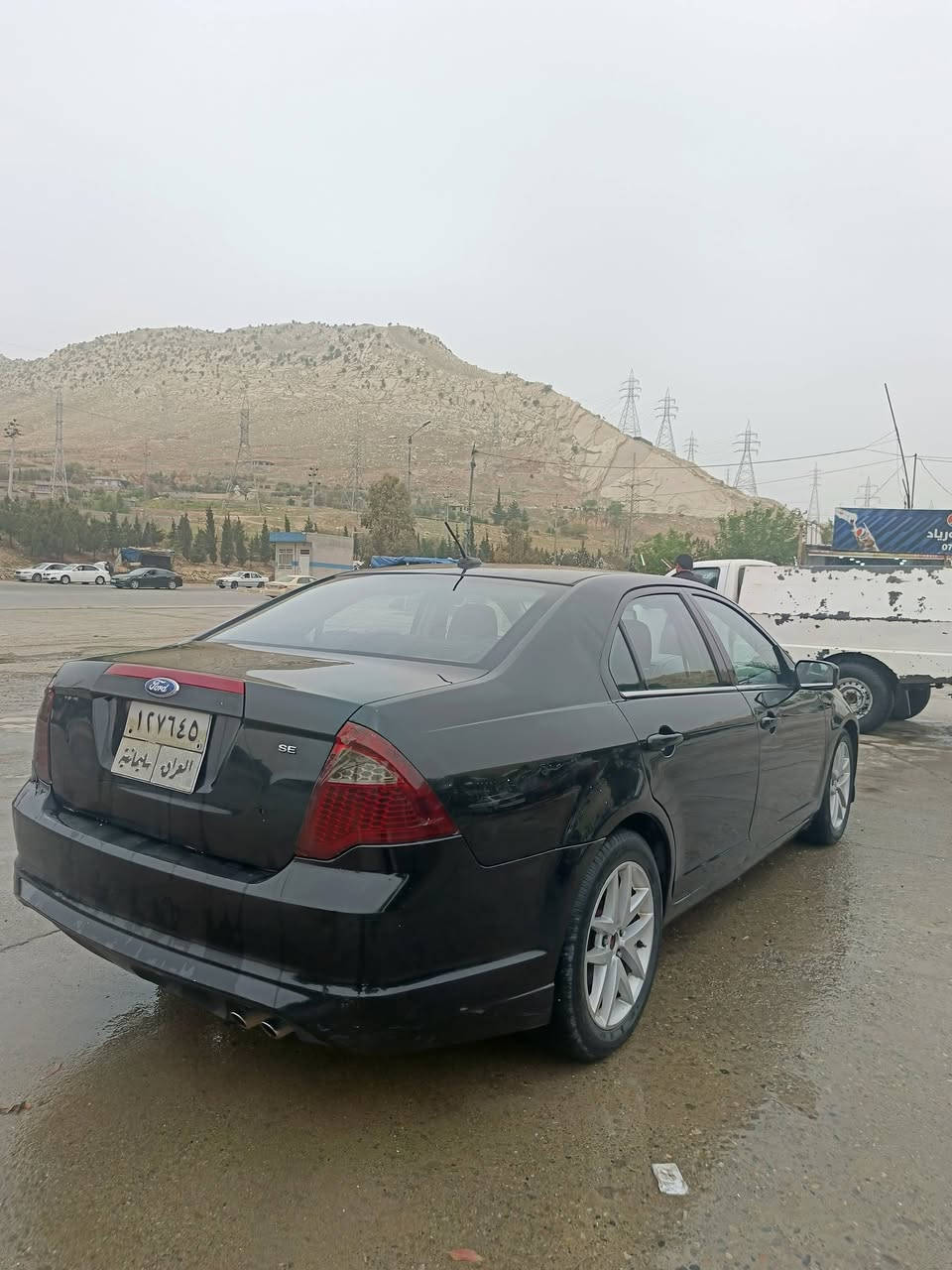 فورد فیوژن 2010 se  سەیارەکە دو پەڵەی بۆیاخە شوێن تەکیە نرخ 80 $ ژم ***********
