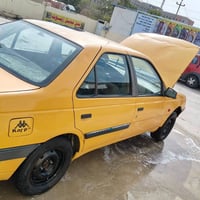 بيجو 405 حداديه اماميه خلفيه كله جديد كهربائيات كله شغاله تايرات خير م...