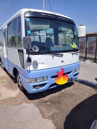 سياره كوستر نيسان 2002 للبيع  مصفره سياره بسمي رقم انكليزي مكينه 3000 ...