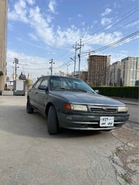 مازدا ٣٢٣ • أربيل