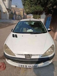 بيجو ٢٠٦ الموديل ٢٠٠٩ بغداد اللون ابيض كير محرك صدر جيد تحويل حديد ٠٧٧...