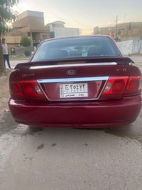 اوبتيما ٢٠٠٤ • محرك ٢٠٠٠ • كير اوتو