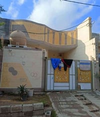 دار مميز للبيع طابو ملك صرف على الفرع الأول من الشارع العام (بغداد – ك...