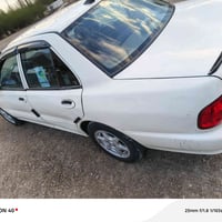 بروتون موديل 2004 مكفوله من كلشي محرك كير  كهربائيات كله شغاله كير اوت...