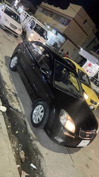 كيا ريو 2011 محرك 16 دوش تحكمات استيرن جامات كهرب  سياره نضيفه حيل بيه...