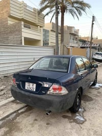 لانسر بومه • ٢٠٠٤ • مكينة وكير مكفولة