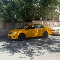 كورلا ٢٠١١باسمي بي بونيت وجامرلغ +باب خلف سايق بي معجون  سكن كوبون بنز...