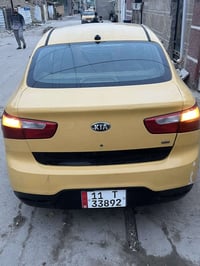 كيه ريو ١٤ رقم بغداد السياره جاهزه وخير من الله بغداد مدينة 0773597065...