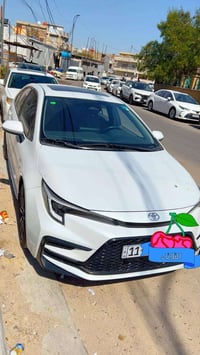 كورلا هايبرت  موديل ٢٠٢٤ / ماشية / ١٥ الف/ جلد لون مميز قرميدي فئة اس ...