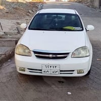 اوبترا مراوس  اب تكسي او بيع 2010   محرك 16  او كير شرط   ضرر شبغ بل ب...