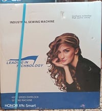 للبيع مكينة خياطة مع اوفر مع مقص رقم الهاتف:07502146495