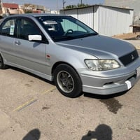 لانسر ٢٠٠٤ • محرك ٢٠٠٠ • تبريد فول